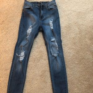 High-waist distressed Jeans